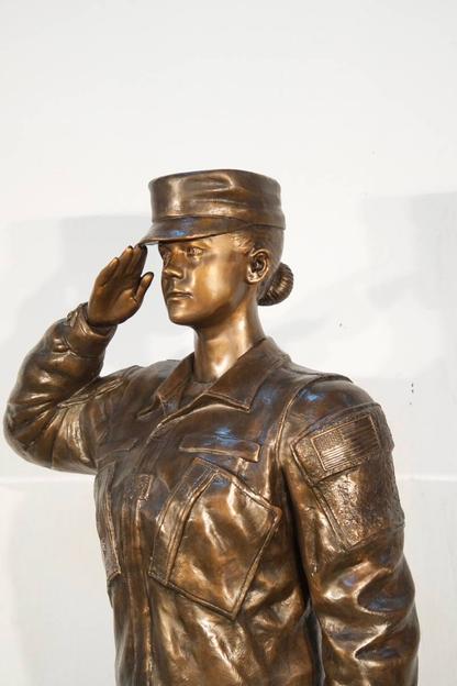 Life-size woman soldier bronze tribute statue for veterans memorial close up 