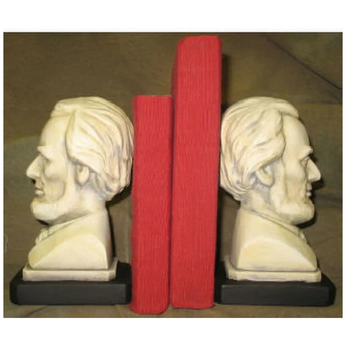 Busts of Lincoln Bookend set, white plaster, holding two red books up.