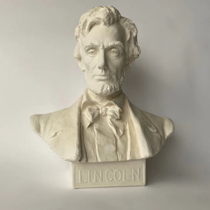 Bust of a historical figure with 'LINCOLN' inscribed below on a plain background