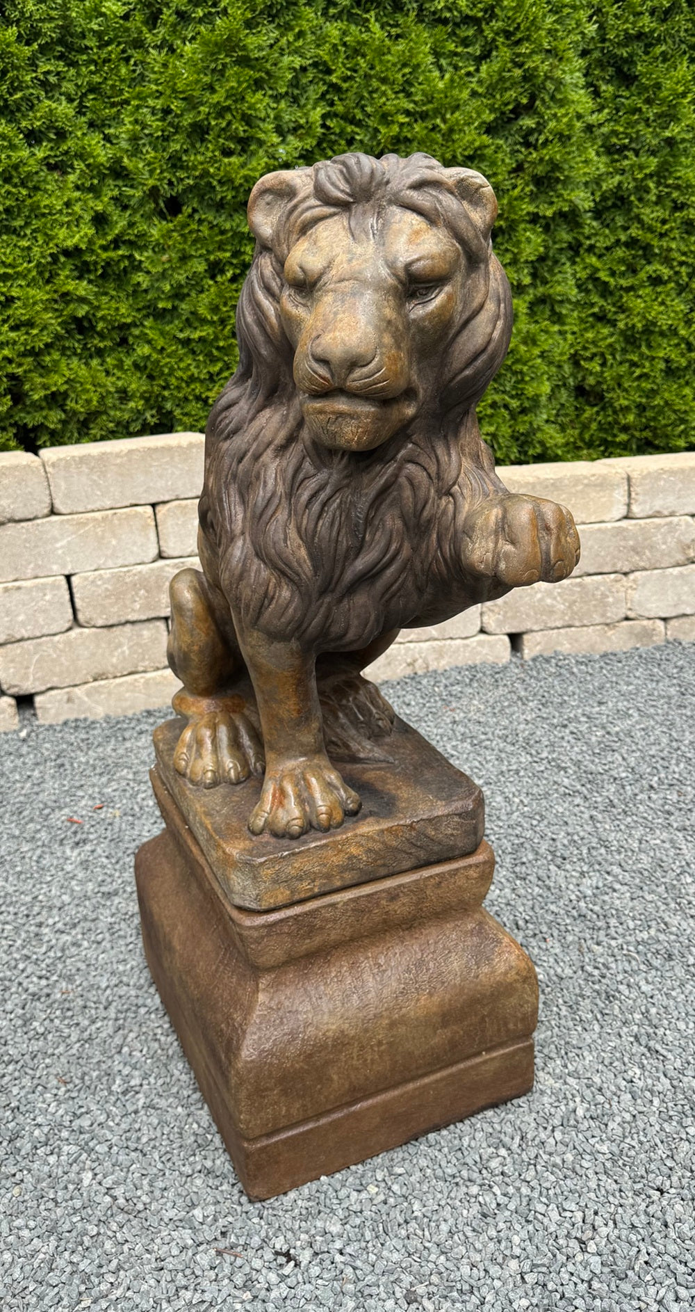 Stone architectural lion statue doorway guardian on base to give it height