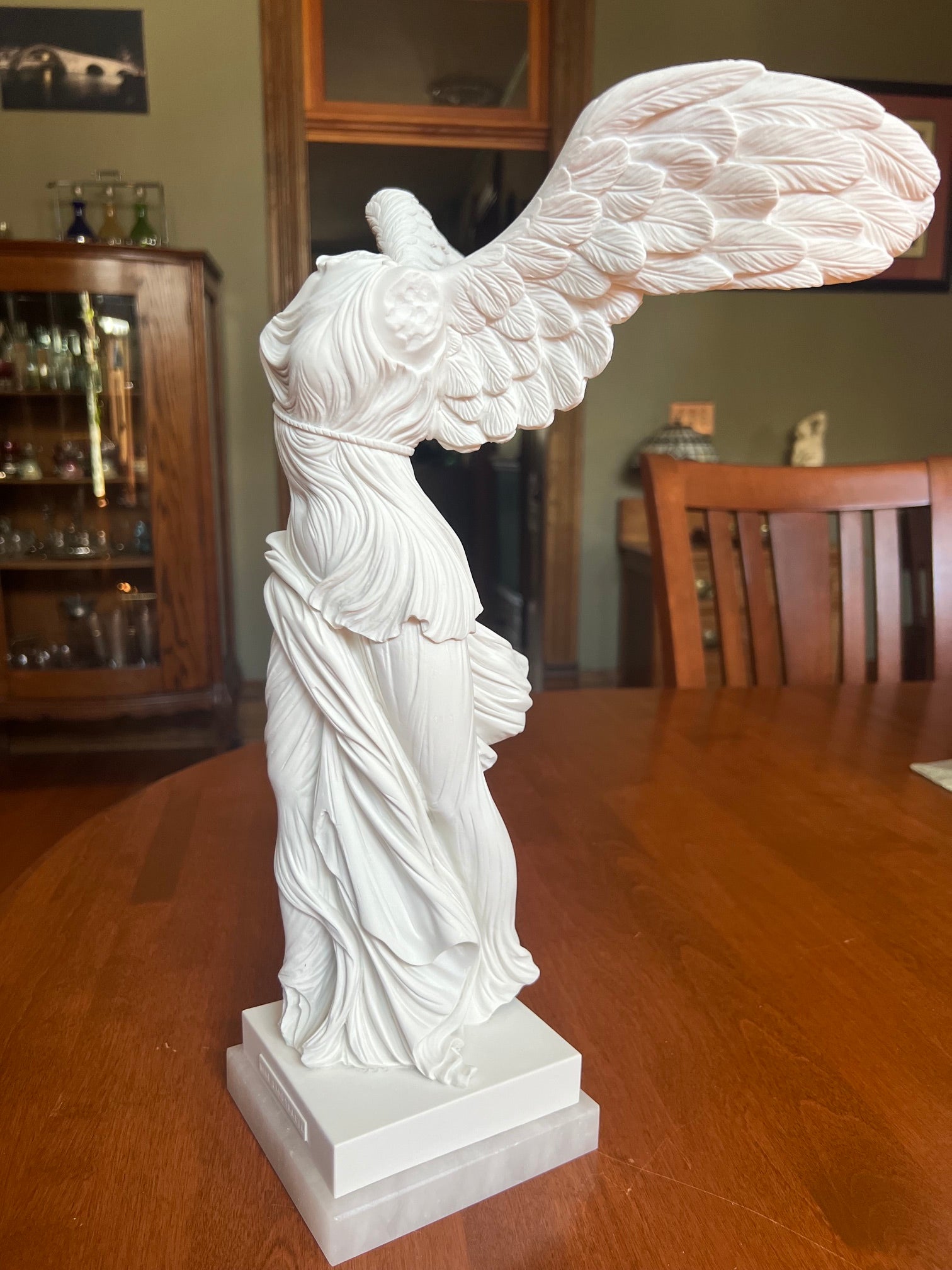 Marble Nike Greek goddess sculpture with alabaster base for sale