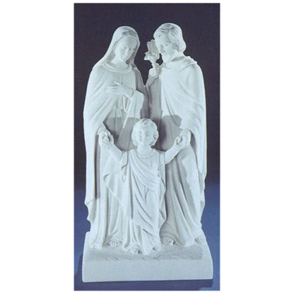 20-inch Sacred Family statue in white Italian marble, displayed outdoors in a garden setting with soft natural lighting
