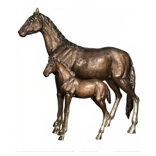 Bronze statue of a mother horse and her foal on a white background