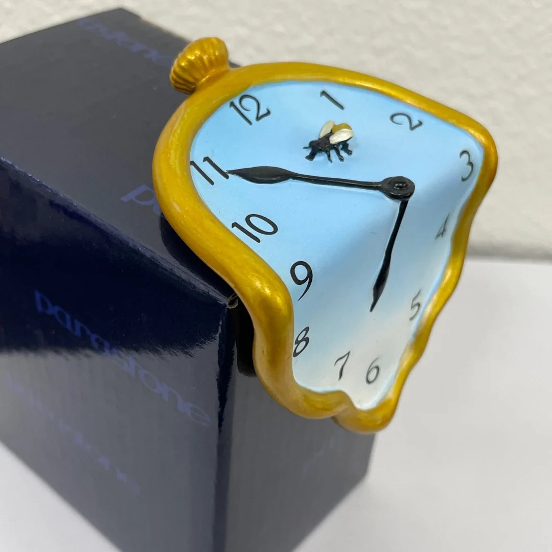 Modern art resin sculpture inspired by The Persistence of Memory by Dali