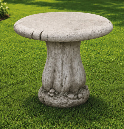 Fairy garden mushroom table with sculpted woodland base