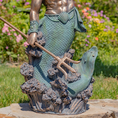 Mythical Sea God sculpture with muscular torso and scaled green tail