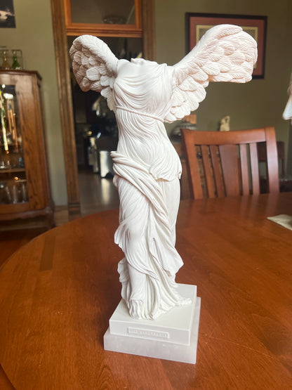 Large museum replica Nike Greek goddess sculpture with alabaster base