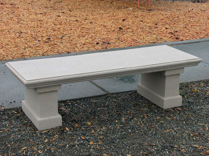 A light gray concrete outdoor bench with block-style legs American made Nisqually garden bench with color choice
