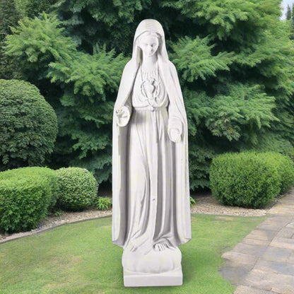 37.5-inch Italian marble Our Lady of Fatima statue, displayed in a landscaped prayer garden with flowers and soft natural surroundings