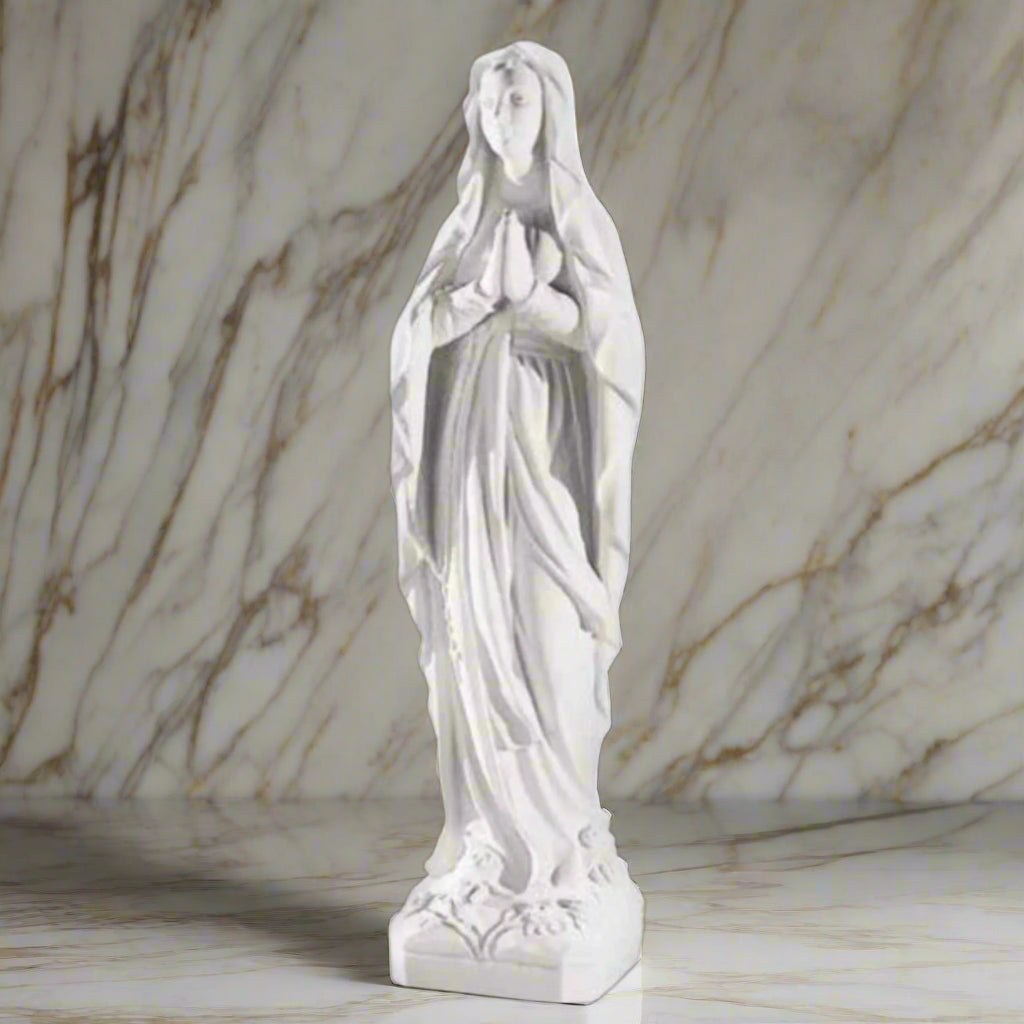 Italian marble statue of Our Lady of Lourdes, 43.5" tall, photographed on a clean white marble background to highlight craftsmanship