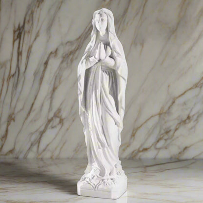 Italian marble statue of Our Lady of Lourdes, 43.5" tall, photographed on a clean white marble background to highlight craftsmanship