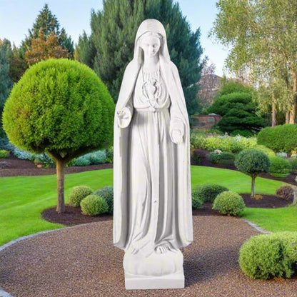 43.5-inch Our Lady of Lourdes statue in white Italian marble, displayed in a tranquil garden shrine with floral arrangements and greenery