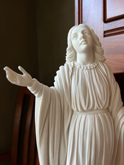 Close up of Madonna Immaculate Conception statue Miraculous Medal style