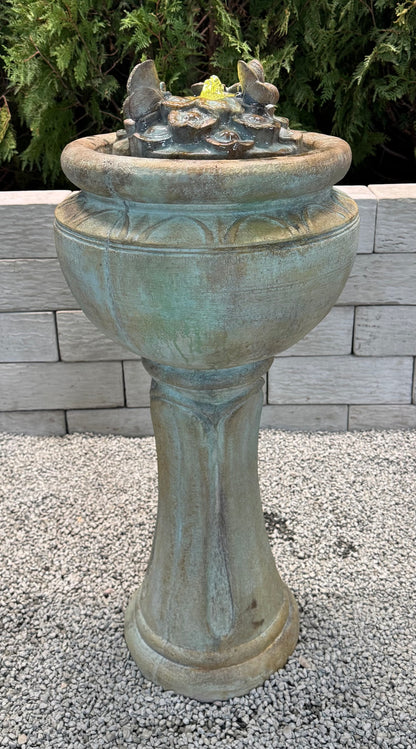 Pedestal butterfly fountain with shimmering nighttime glow tall on pedestal