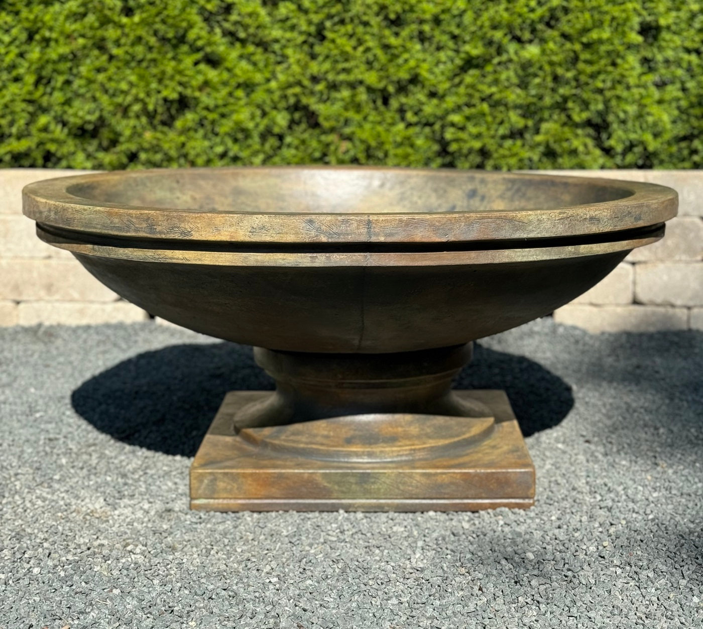 Cast stone garden bowl planter with square pedestal base