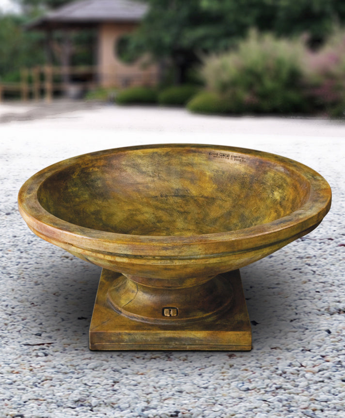 Wide shallow cast stone planter for garden or courtyard