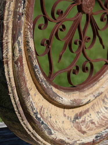 Distressed Architectural Wall Medallion Sculpture Close up of scroll work in Iron 