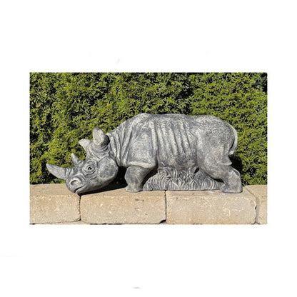 Safari-style rhinoceros statue with attached grass base zoo-themed landscapes