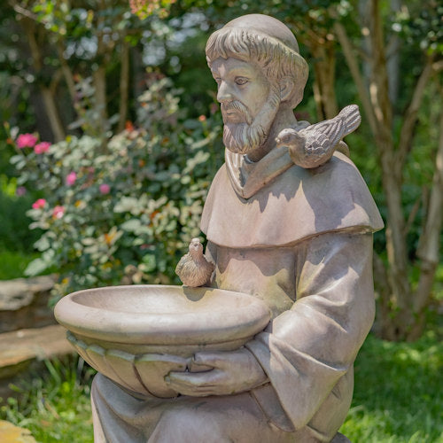 Side view Sitting Saint Francis Statue holding a birdbath surrounded by woodland animals in antique grey serenity