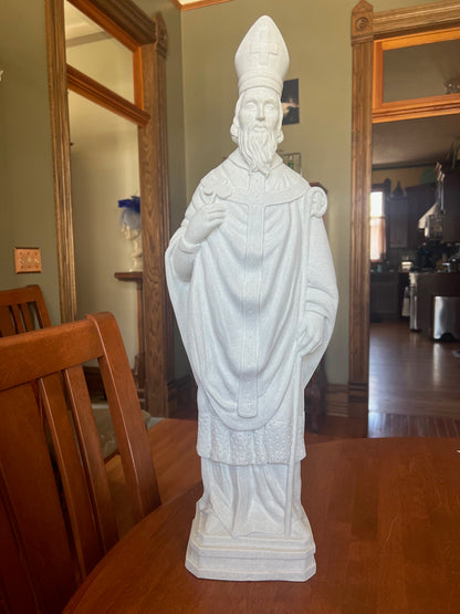 Saint Patrick in a faux granite color will be a welcome addition to your home or garden