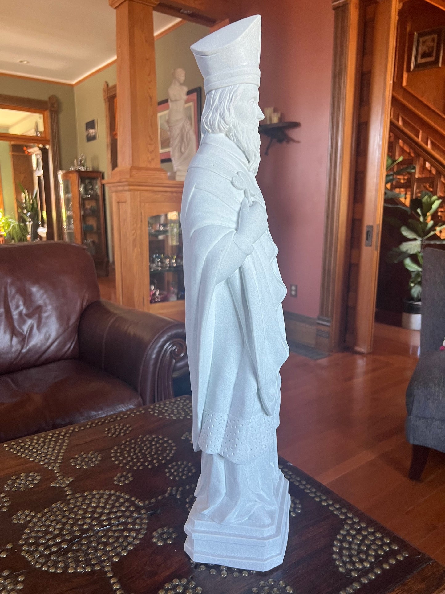 Saint Patrick in a granite color will be a welcome addition to your home or garden side view
