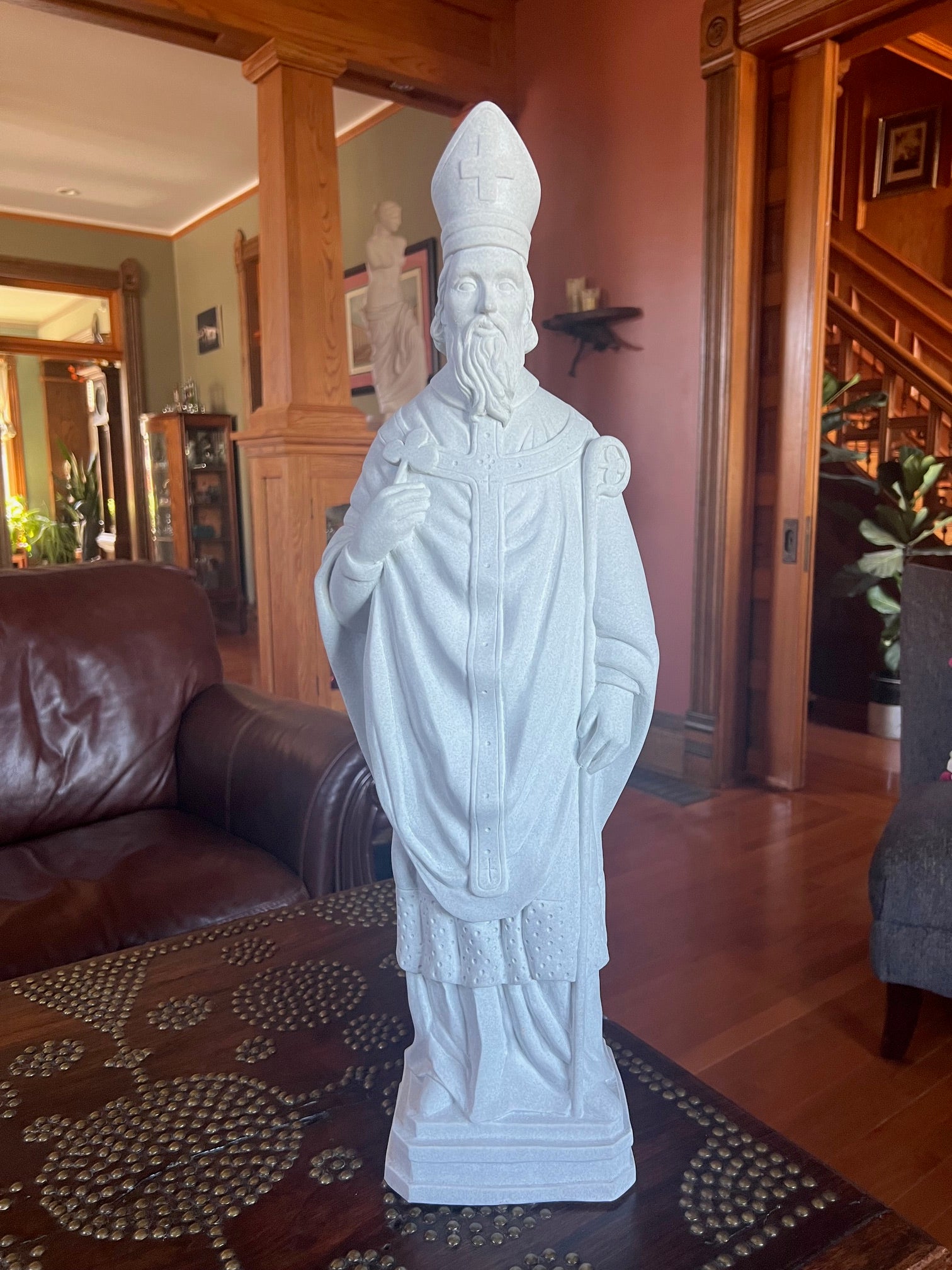 Saint Patrick statue faux granite garden statue holding the symbolic shamrock