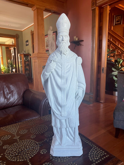Saint Patrick statue faux granite garden statue holding the symbolic shamrock