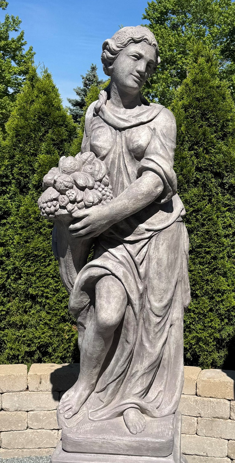 Classical Summer season woman statue with fruit and flowers with cornucopia