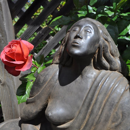 Close up of face Sigrid Herr small Western Buddha sculpture feminine art meditation statue