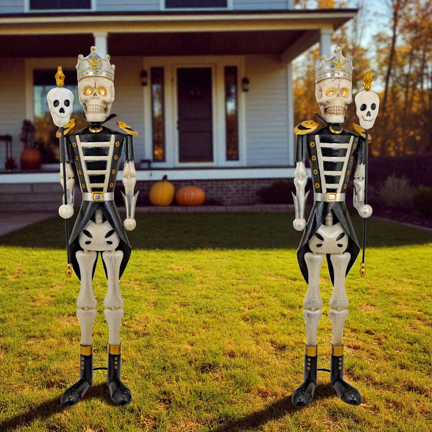 Set of two silver skeleton sentry soldiers standing in a Halloween yard display