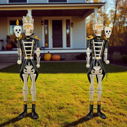 Set of two silver skeleton sentry soldiers standing in a Halloween yard display
