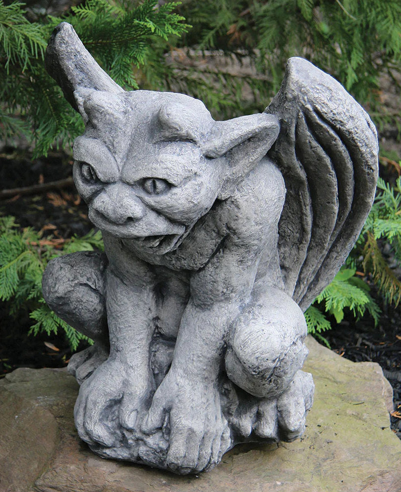Sculpture of Gargoyle called Jonas made of cement garden statue winged fierce looking