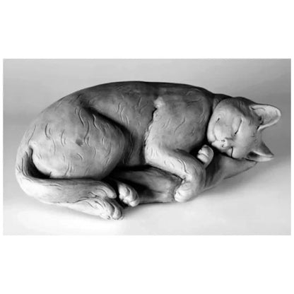 Peaceful sleeping cat garden sculpture with detailed paws