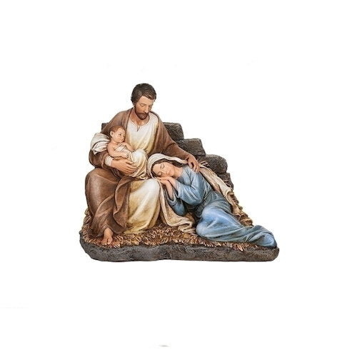 Statue of a family scene with a baby, mother, and father on a white background