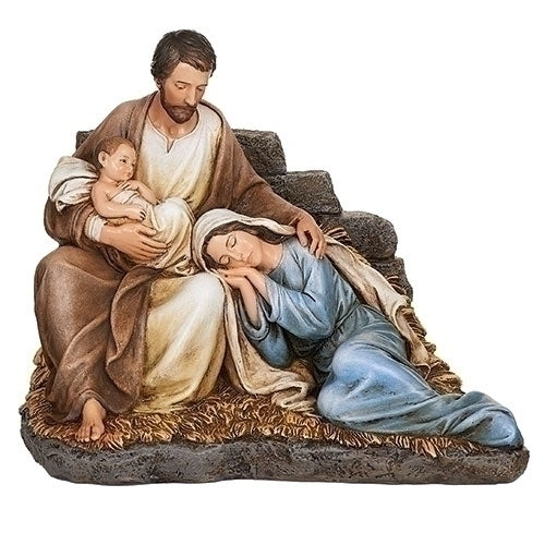 Statue of the Holy Family with Joseph, Mary, and baby Jesus on a white background