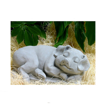 Cement sleeping pig garden sculpture lying curled up with eyes closed
