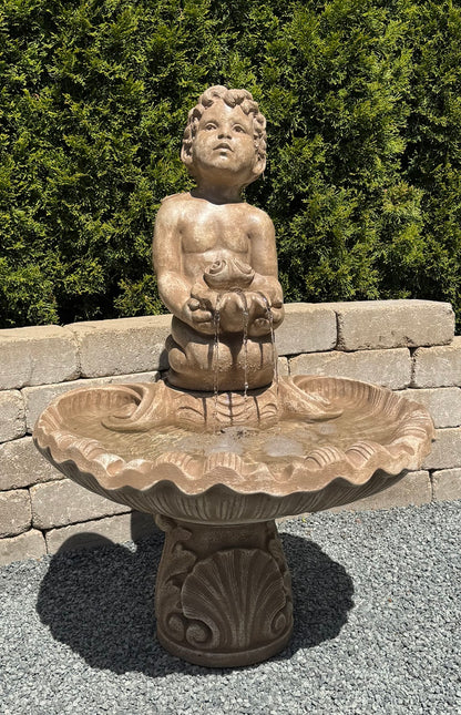 boy cherub garden fountain cast stone holding shell Italian inspired water feature