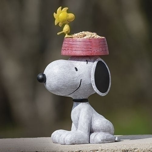 Snoopy bird feeder statue featuring Woodstock sitting on a bowl atop Snoopy’s head, creating a playful Peanuts-themed garden bird feeder display.
