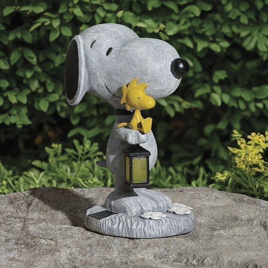 LED solar Snoopy garden statue featuring Snoopy holding a lantern with Woodstock perched nearby, creating a charming Peanuts-themed outdoor display