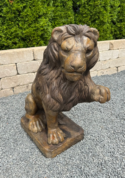 Henri studio cast stone lion statue with left paw up garden sculpture