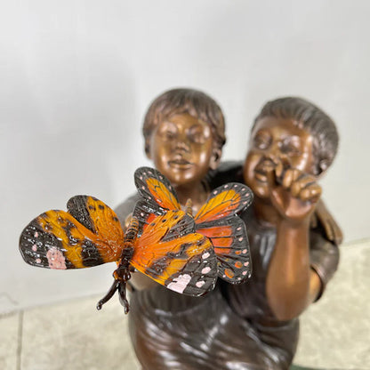 Close Up Boy & Girl Sitting on Stump with Monarch Butterflies Bronze Statue