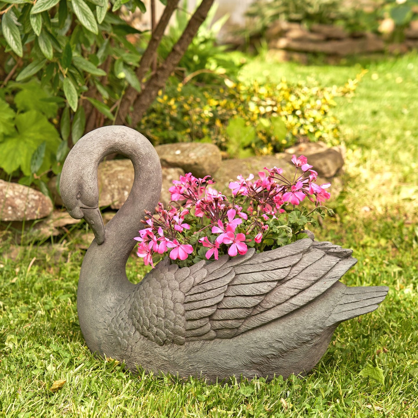 Tall swan planter set with head up and head down designs, inspired by classical garden art sculptures