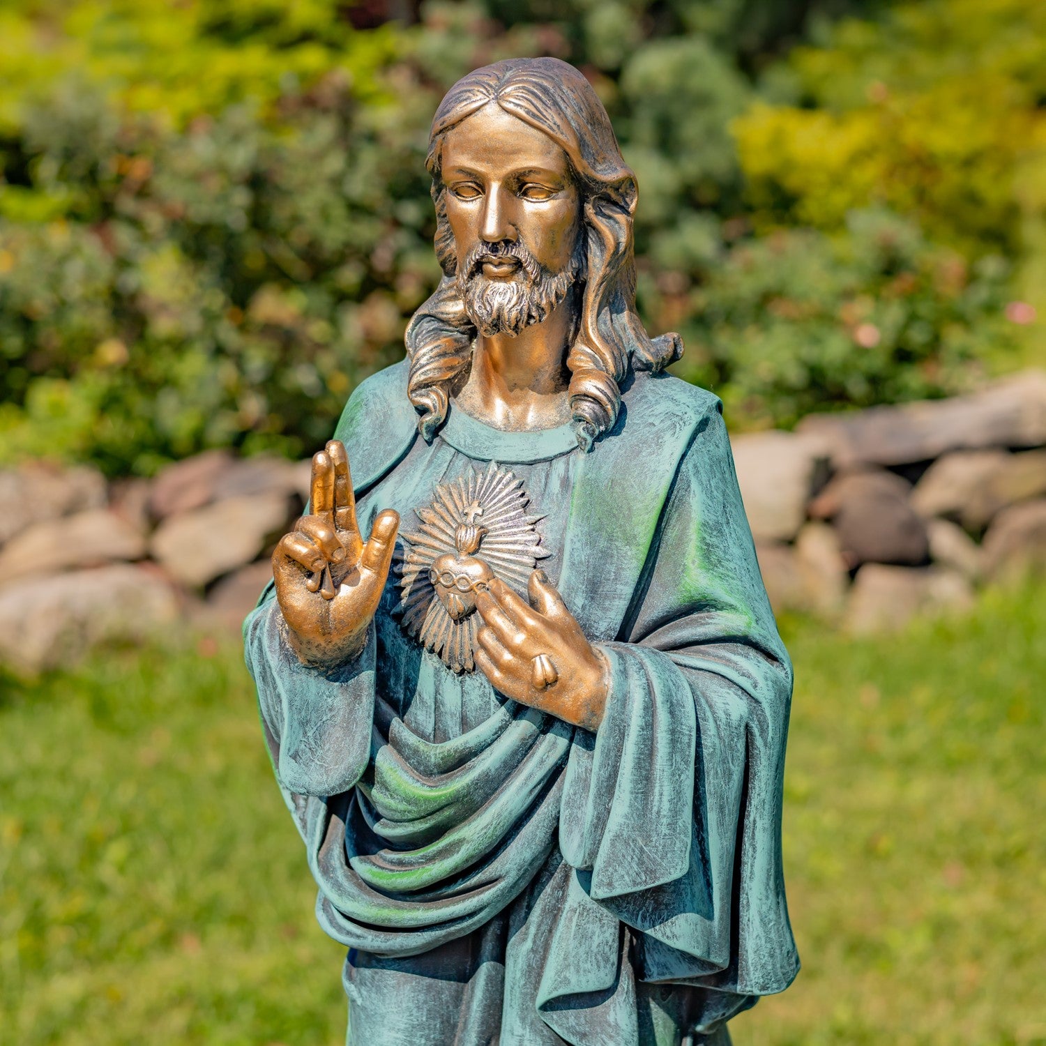 Antique bronze Sacred Heart of Jesus statue A powerful symbol of faith and devotion remembrance spaces spiritual setting