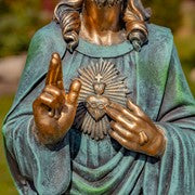 Close up of blessing hand of Christ Sacred Heart Christ Outdoor Devotional Sculpture