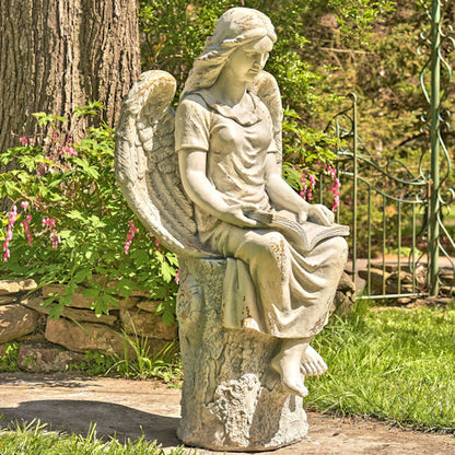 Tall Sitting Angel Statue Reading Book captures a moment of celestial reflection and timeless grace