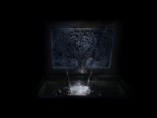 Tree of Life Wall Fountain Garden Cement Cascading Decorative nighttime view