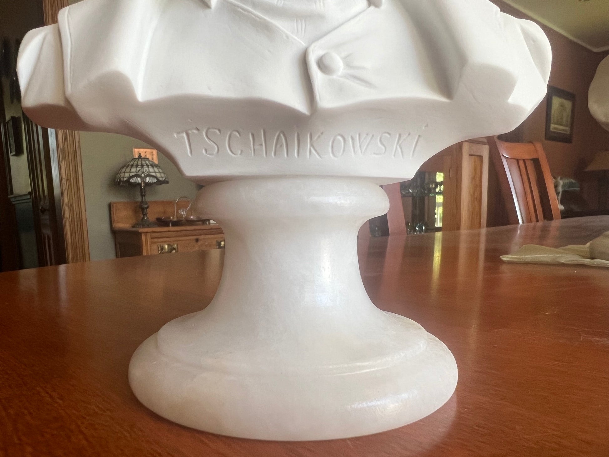 The name inscribed on the base, Tschaikowski reflects a traditional European specifically German