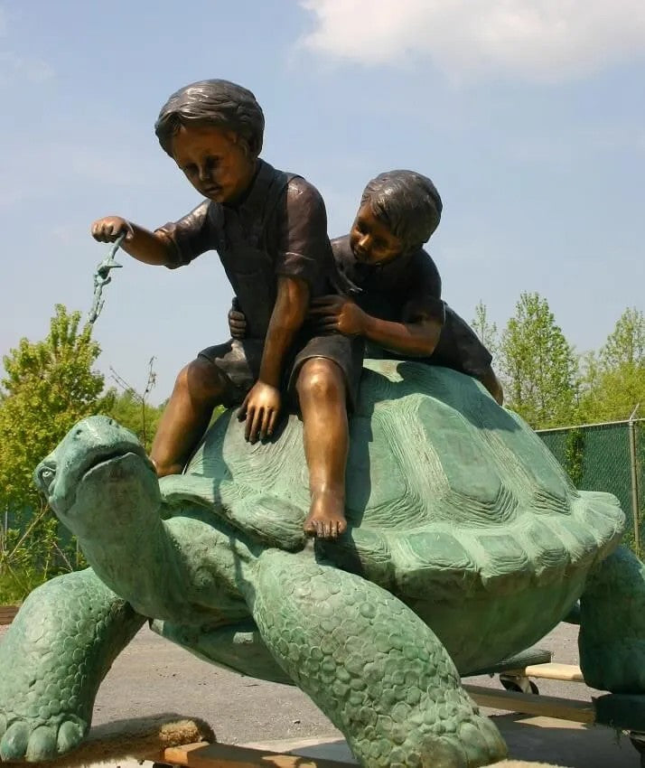 Two Boys Riding Turtle Bronze Sculpture large scale statue on back of tortoise