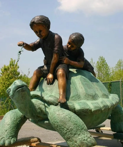 Two Boys Riding Turtle Bronze Sculpture large scale statue on back of tortoise
