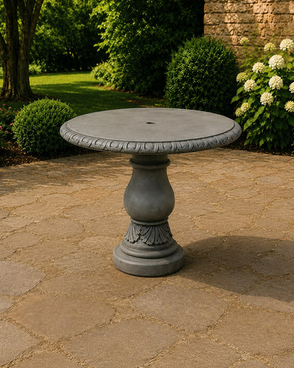 Create an elegant focal point for your garden, patio, or courtyard with the Verona Garden Table